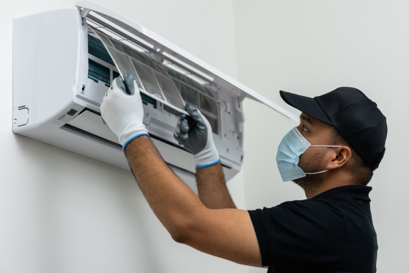 Close-up of common air conditioning problems including refrigerant leak and dirty coil